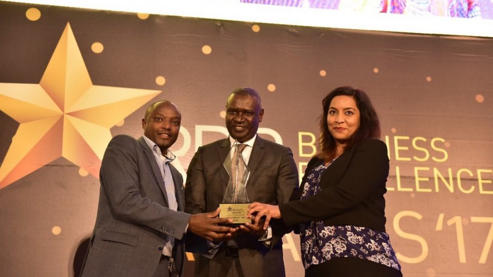 PSF Chairman Benjamin Gasamagera hands the Investor of the Year Award to Africa Improved Foods