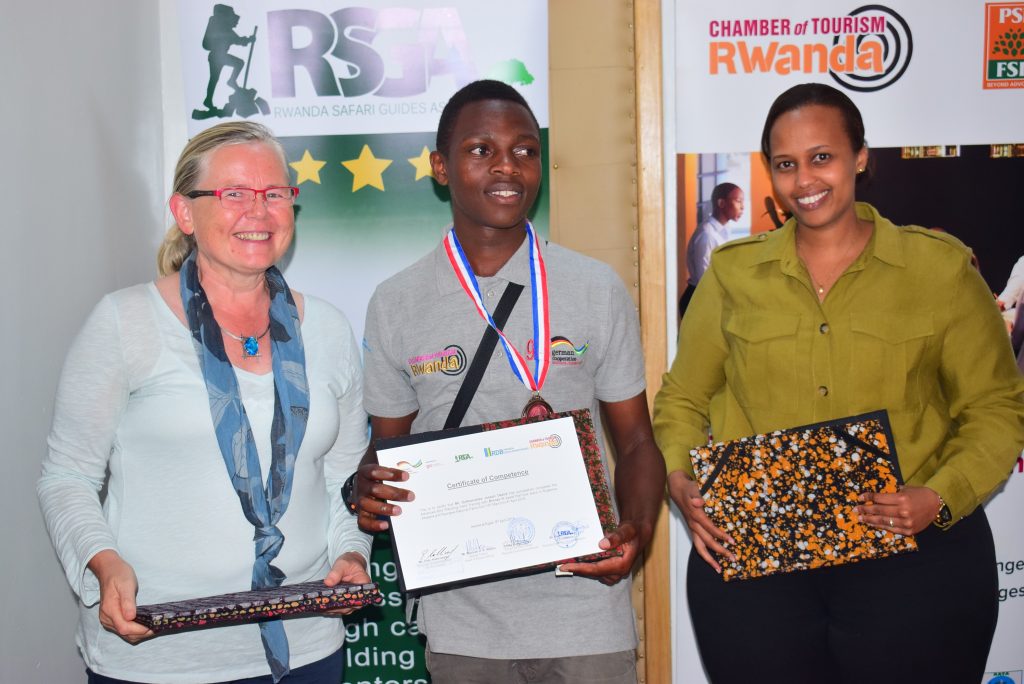 Ellen Kallinowsky, the Principal Technical Advisor of the Eco-Emploi Program at GIZ (L), one of the newly certified birding guides (C) and the RDB Head of Tourism and Conservation, Ariella Kageruka (R)
