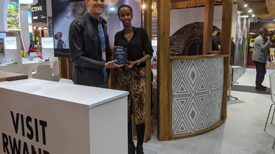 RDB’s Chief Tourism Officer, Belise Kariza (R) receives the award on behalf of Visit Rwanda_