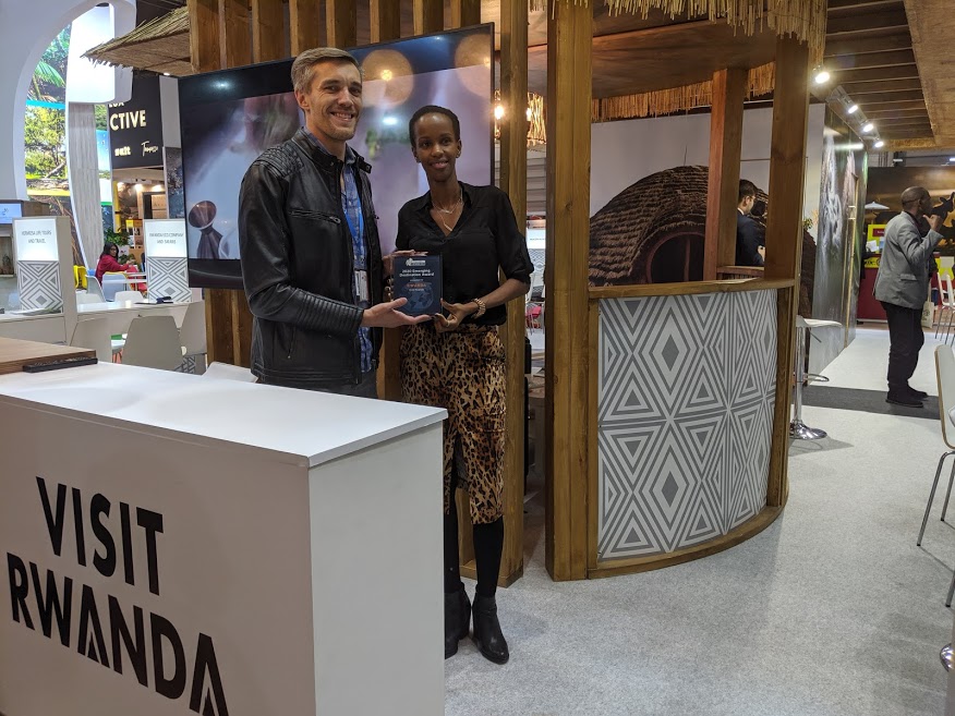 RDB’s Chief Tourism Officer, Belise Kariza (R) receives the award on behalf of Visit Rwanda_